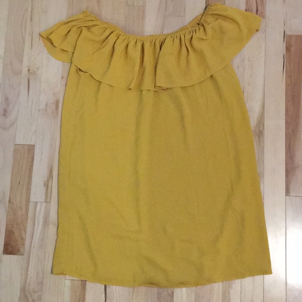 Off the shoulder dress with ruffle detail.